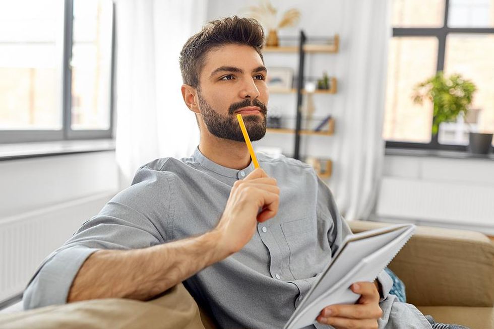 Man thinks about how he would answer hard interview questions