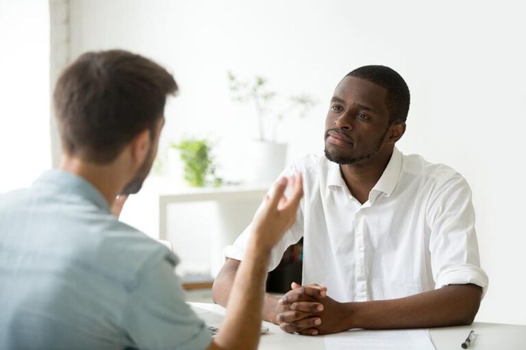 Man prepares to answer an interview question