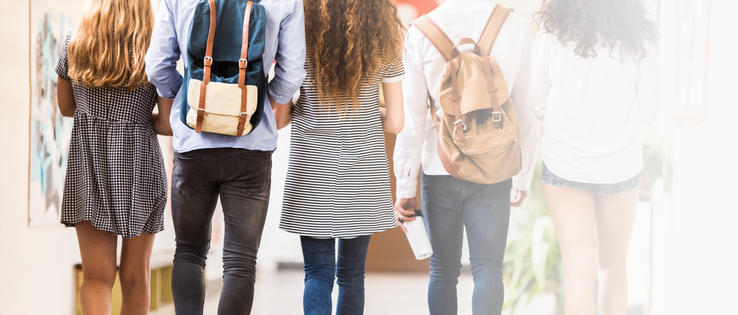 middle school students walking to class