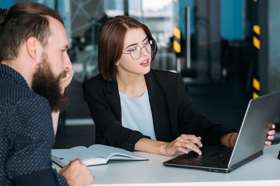 Man receives advice from a career coach