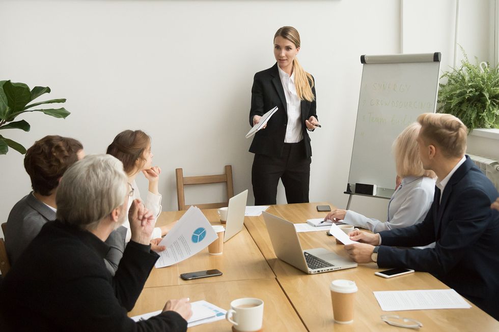 CEO leader talks about purpose during a team meeting
