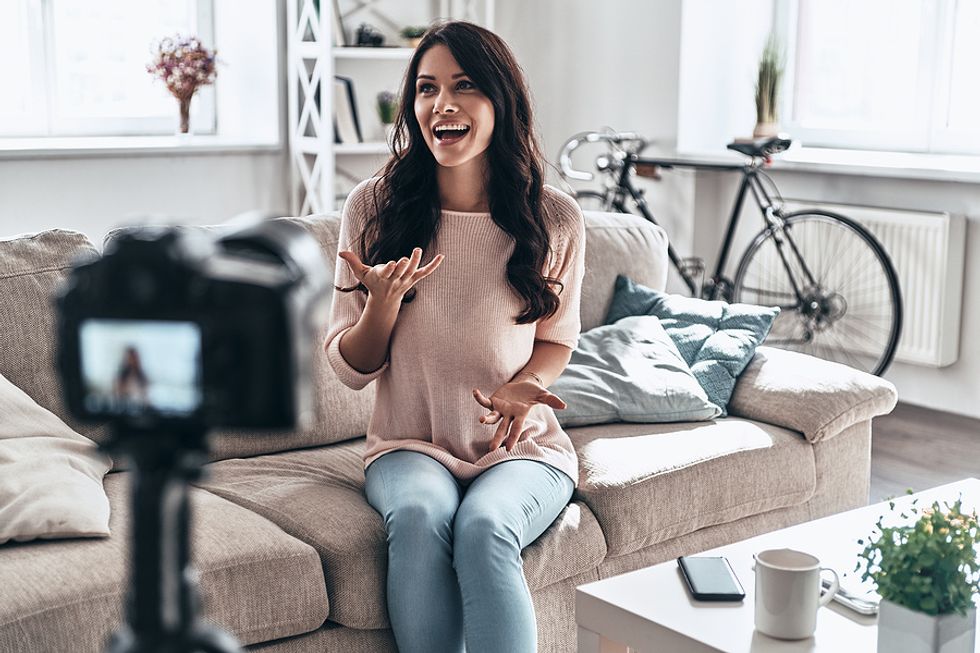Young professional makes a video for her LinkedIn profile