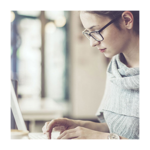 Young woman uses a laptop
